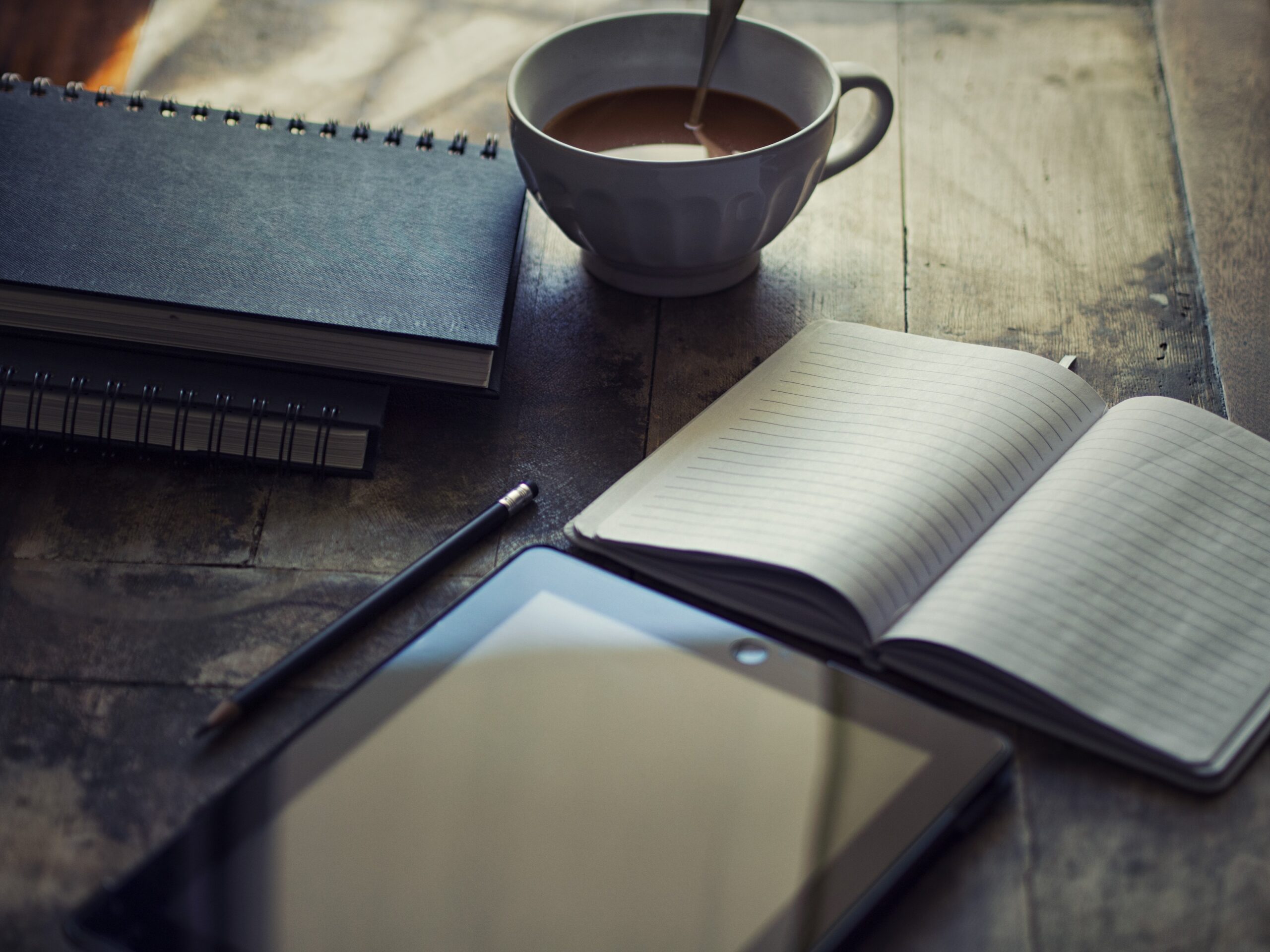 Letter, books, coffee and notebook